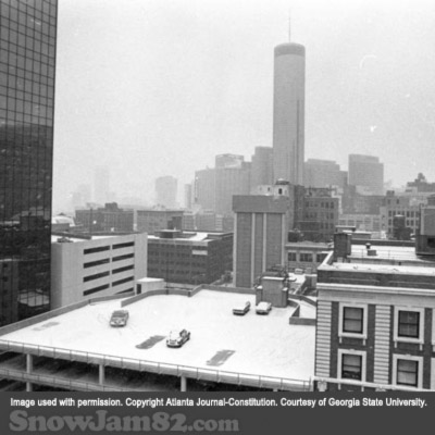 View of a snow covered parking garage and of the Westin Hotel during a snow storm - January 13, 1982 – Nick Arroyo
