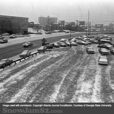 Abandoned vehicles scattered along I-85 during a snow storm that left highways icy and congested - January 13, 1982 – AJC File