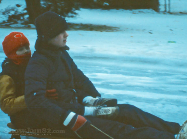 Snow Jam 82 - Brothers sledding in the snow