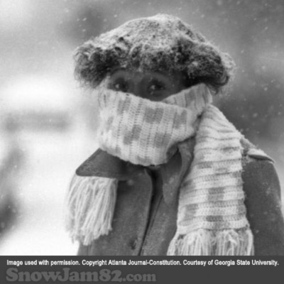 Bundled up pedestrian during a snow storm - January 14, 1982 – AJC File