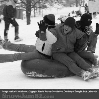 Crowds gather in Piedmont Park for sledding and tubing during a snow storm - January 14, 1982 – Rich Mahan