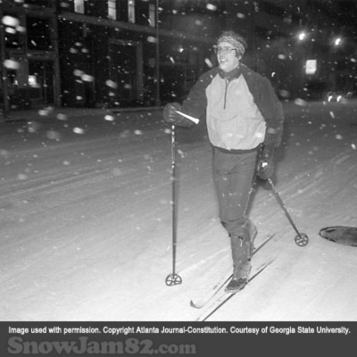 Man on skis travels through downtown Atlanta during a snow storm - January 14, 1982 – AJC File