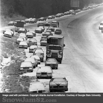 Abandoned cars on I-285, looking east from Roswell Road overpass at 8 Wednesday morning - January 12, 1982 – George A. Clark